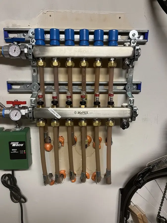 Plumber performing Water Heater Repair at a residential property in Muhlenberg